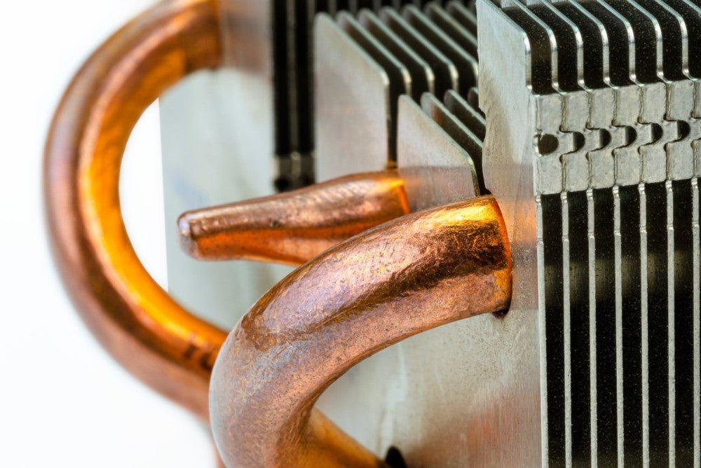 Closeup of copper evaporator coil.
